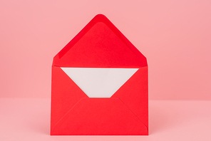red envelope with love letter isolated on pink