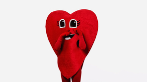 sad person in heart-shaped costume touching cartoon eyes while imitating crying isolated on white