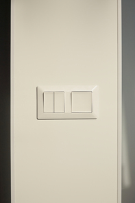 modern switch on white wall at home
