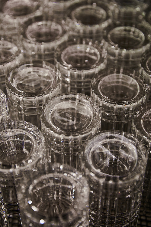 selective focus of empty cocktail glasses in bar