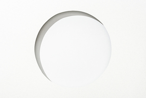 cut out round hole in white paper on white simple background