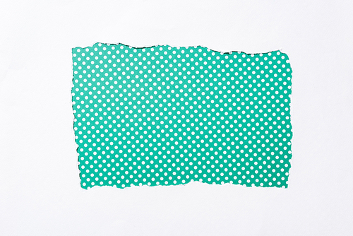 polka dot green and white colorful background in white torn paper hole