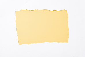 light yellow colorful background in white torn paper hole