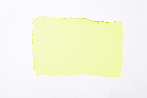 lime green colorful background in white torn paper hole