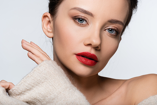 Portrait of stylish model with red lips  isolated on white