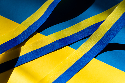 Close up view of blue and yellow ribbon on ukrainian flag