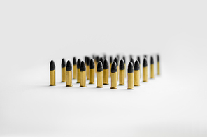 set of bullets with same caliber on white background