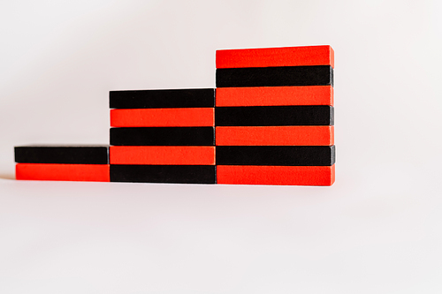 red and black blocks in stairs shape on white background