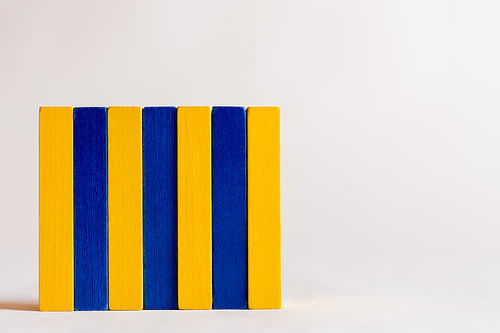 rectangle made of blue and yellow blocks on white background, ukrainian concept