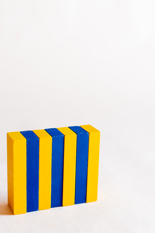 colored blue and yellow blocks on white background with copy space, ukrainian concept