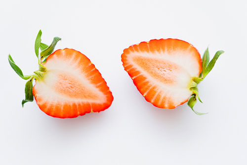 Close up view of cut strawberry on white background