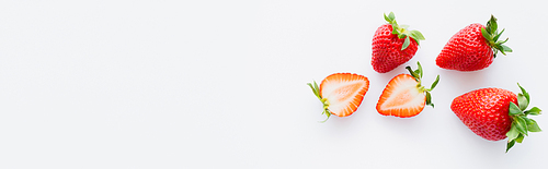 Top view of sweet strawberries on white background with copy space, banner