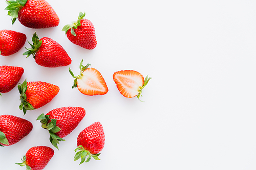 Top view of juicy strawberries on white background