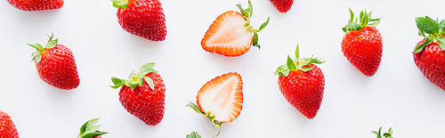 Top view of fresh red strawberries on white background, banner