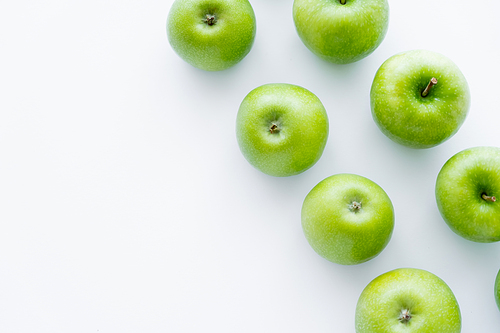 top view of rows with delicious apples on white