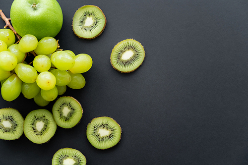 top view of green ripe fruits on black