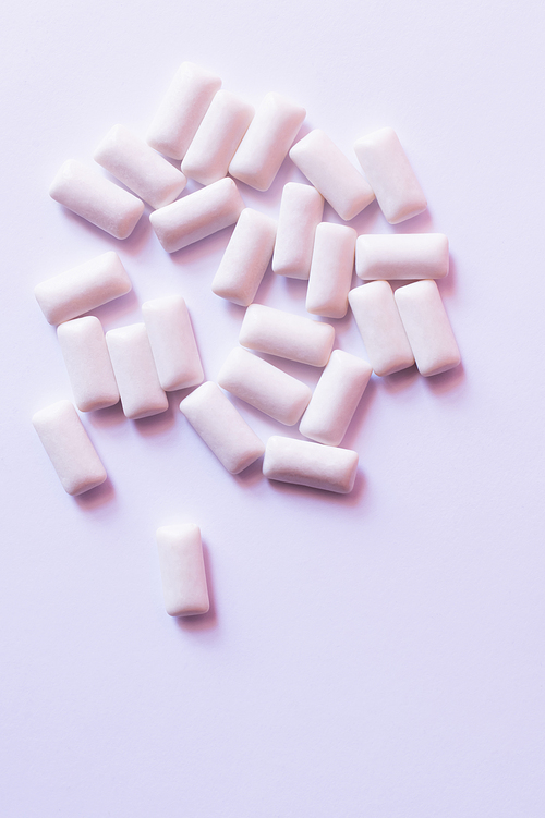 Top view of chewing gums on white background