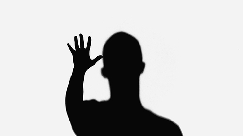 silhouette of man waving hand isolated on white