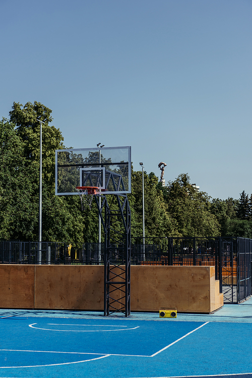 modern court with vintage record player under basketball hoop