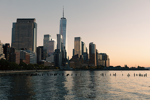 Financial district and World Trade Center during sunset in New York City