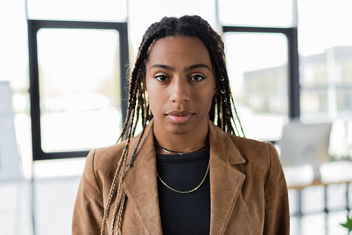 Portrait of african american manager in office looking at camera in office