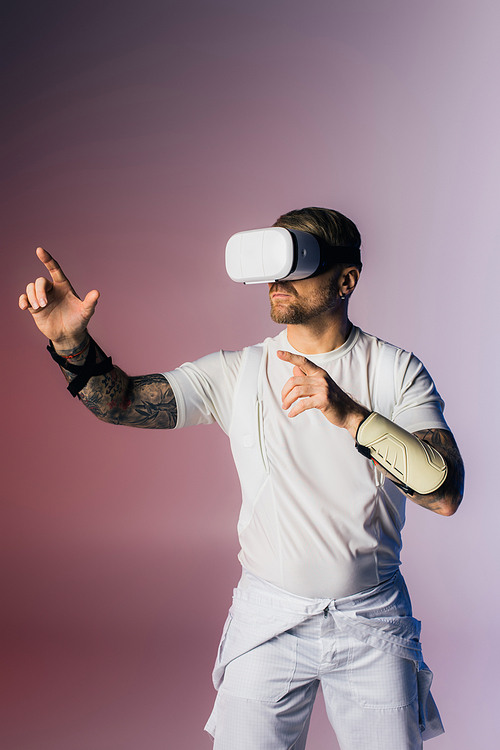 A man in a VR headset, dressed in a white shirt and white shorts, explores the metaverse in a studio setting.