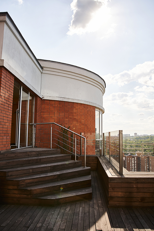 A towering structure adorned with numerous windows and staircases that stretch towards the sky