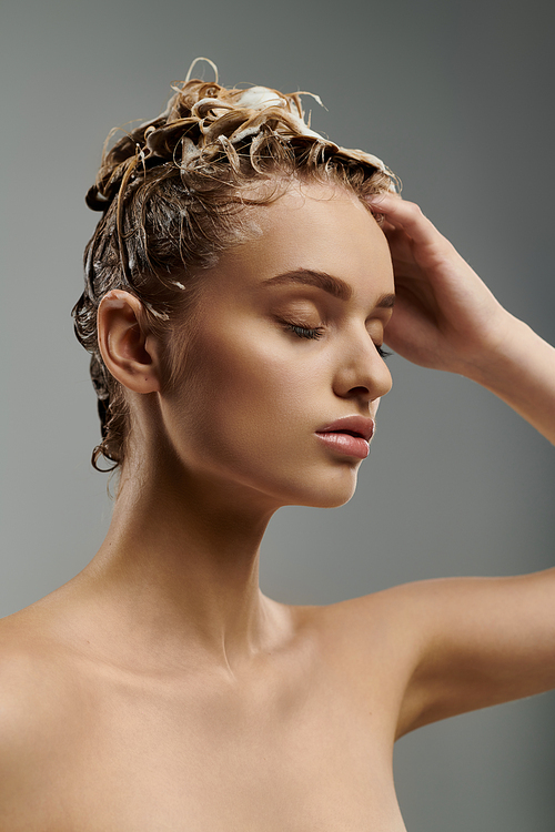 Beautiful woman washing her hair.