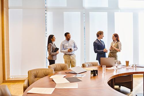 Multicultural professionals collaborating around a conference table.