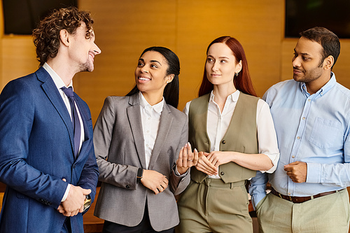 Diverse group of business people standing side by side.