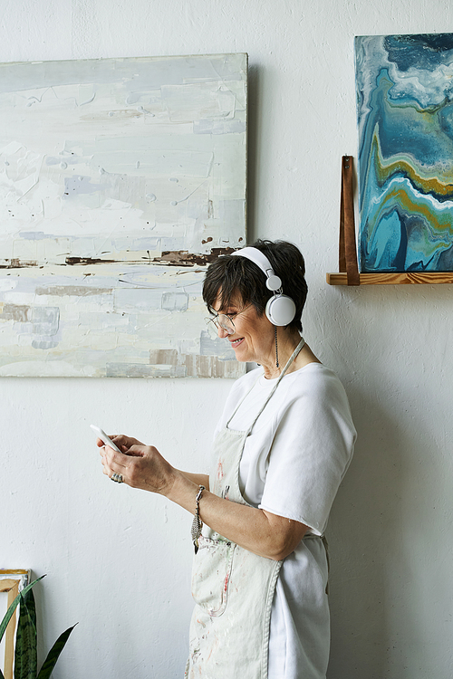 A talented woman engages with her art in a serene studio setting.