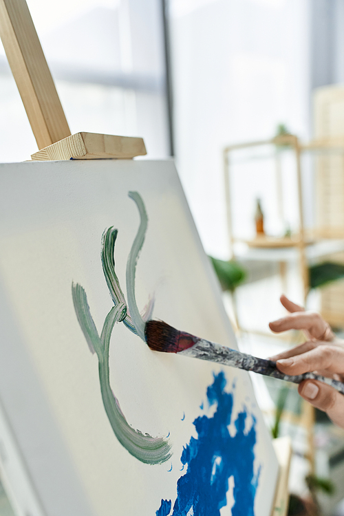 A dedicated artist immerses herself in creativity at her studio.