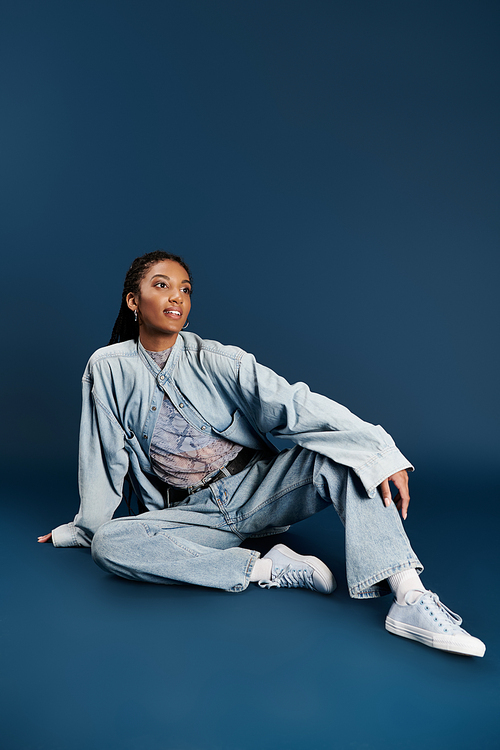 The young woman showcases her unique fashion sense while seated elegantly on the floor.