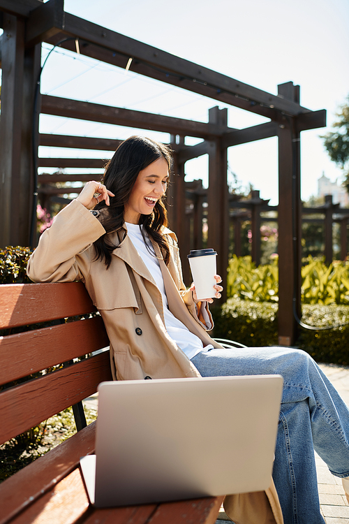 Wrapped in warm autumn attire, she sips coffee, smiling as autumn leaves dance around her.