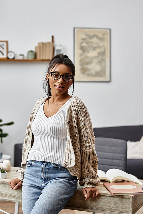 A young woman studies remotely from her home, exuding focus and comfort in her cozy space.