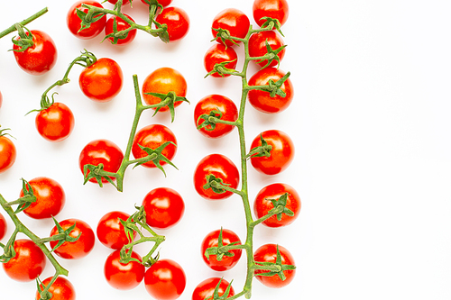 Fresh cherry tomatoes isolated on white. Copy space