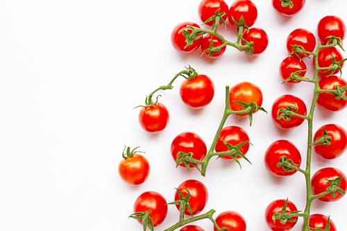 Fresh cherry tomatoes isolated on white. Copy space