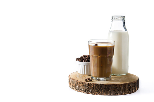 Iced coffee or caffe latte in tall glass on wooden table