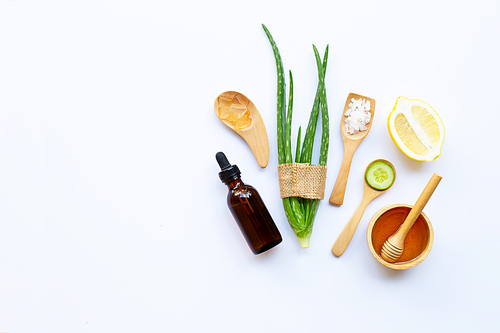 Aloe vera, lemon, cucumber, salt, honey. Natural ingredients for homemade skin care on white. Copy space