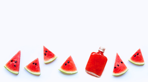 Bottle of healthy watermelon juice with slice isolated on a white background. Copy space