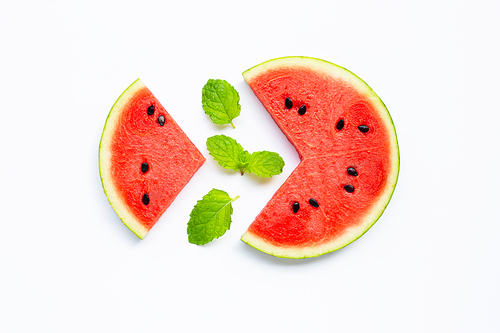 Slices of watermelon  with mint leaves isolated on white, top view