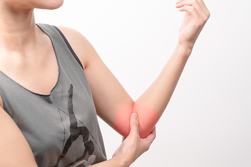 closeup women elbow pain/injury with red highlights on pain area with white backgrounds, healthcare and medical concept