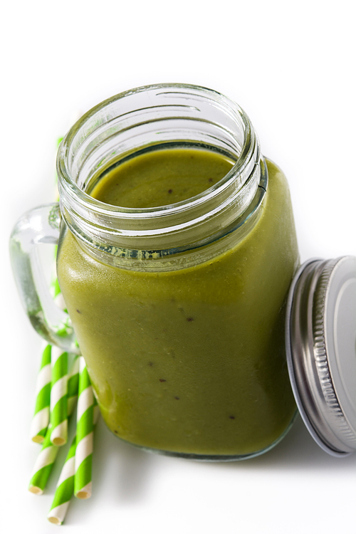 Healthy green smoothie with spinach,mint, kiwi, ginger and green isolated on white.