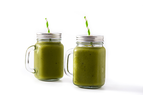 Healthy green smoothie with spinach,mint, kiwi, ginger and green apple isolated on white