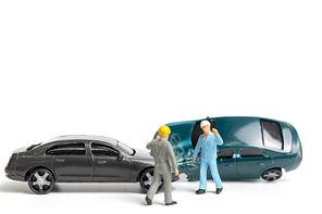 Miniature people : Accident scene, car crash on white background , Safety driving concept