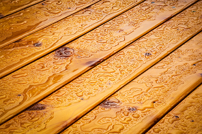 background or texture slant wooden table top with water dropsslant wooden table top with water drops