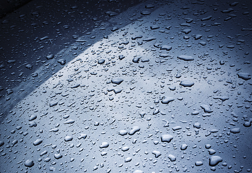 background or texture raindrops on a metallic paint sheet