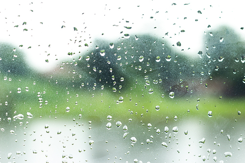 Rain drop on glass window background.