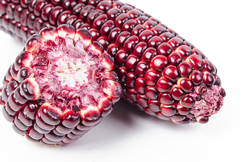 red corn on a white background