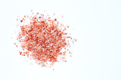 Pink himalayan salt on with background. Copy space
